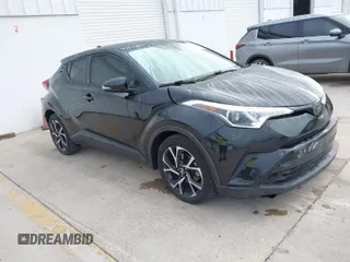 2019 Toyota C-HR XLE with VIN NMTKHMBX2KR094898, listed as a IAAI auction lot 41940883 with 94,351 mi miles. Bid and sale history available at carsss.com. Image 1.