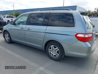 2007 Honda Odyssey EX-L with VIN 5FNRL38727B017587, listed as a IAAI auction lot 41900739 with 216,909 mi miles and . Bid and sale history available at carsss.com. Image 3.
