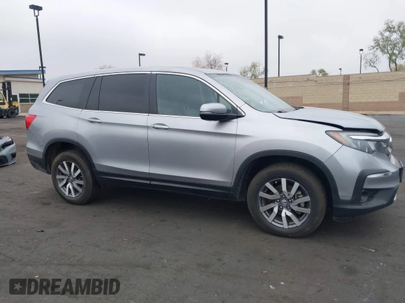 2019 Honda Pilot EX-L with VIN 5FNYF6H54KB055687, listed as a IAAI auction lot 42050539 with 50,989 mi miles and . Bid and sale history available at carsss.com. Image 14.
