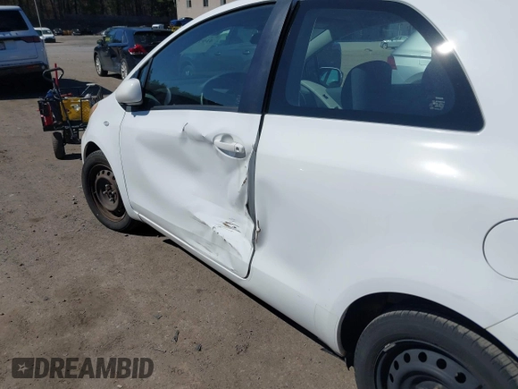 2011 Toyota Yaris with VIN JTDJT4K30B5339454, listed as a IAAI auction lot 41977912 with 206,707 mi miles. Bid and sale history available at carsss.com. Image 6.