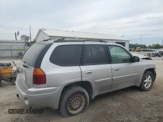2005 GMC Envoy SLT with VIN 1GKDT13S852330514, listed as a Copart auction lot 71190504 with 203,616 mi miles and Salvage Title. Bid and sale history available at carsss.com. Image 3.