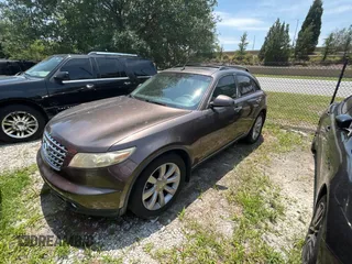 2003 Infiniti FX Options z VIN JNRAS08W93X205643, wystawiony jako Copart lot #58410885 z przebiegiem 210 110 mil mil oraz Tytuł czysty. Historia ofert i sprzedaży dostępna na DreamBid. Obrazek 2.