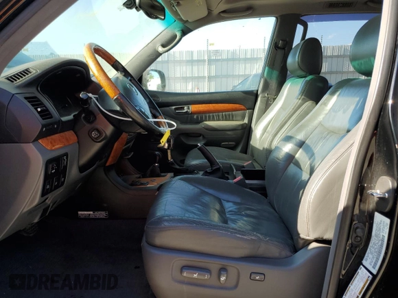 2005 Lexus GX 470 with VIN JTJBT20X650068722, listed as a Copart auction lot 62931984 with 247,819 mi miles and Salvage Title. Bid and sale history available at carsss.com. Image 7.