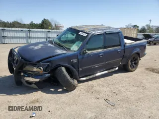 2002 Ford F-150 XLT with VIN 1FTRW08L72KD73581, listed as a Copart auction lot 47857415 with 312,287 mi miles and Salvage Title. Bid and sale history available at carsss.com. Image 1.