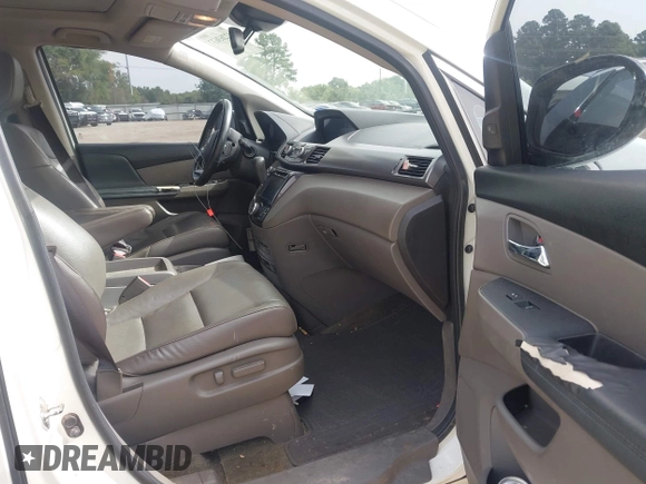 2015 Honda Odyssey Touring Elite with VIN 5FNRL5H96FB045968, listed as a IAAI auction lot 42263637 with 207,637 mi miles and . Bid and sale history available at DreamBid. Image 5.