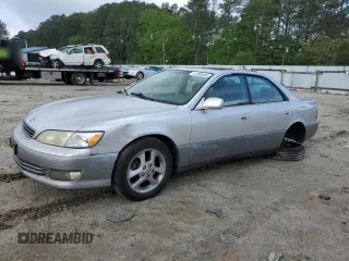 2001 Lexus ES 300 z VIN JT8BF28G410325142, wystawiony jako Copart lot #58033085 z przebiegiem 202 542 mil mil oraz Szkoda całkowita • Salvage title. Historia ofert i sprzedaży dostępna na DreamBid. Obrazek 1.