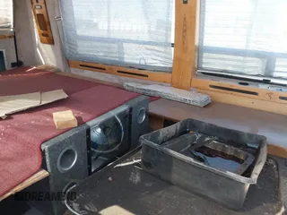 1994 GMC Vandura z VIN 1GDEG25K4RF523356, wystawiony jako IAAI lot #41854612 z przebiegiem 187 013 mil mil oraz . Historia ofert i sprzedaży dostępna na DreamBid. Obrazek 8.