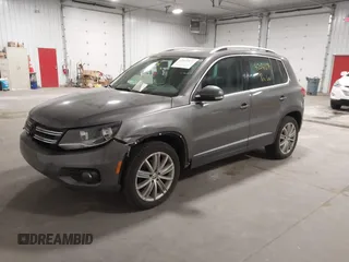 2012 Volkswagen Tiguan S with VIN WVGBV7AX2CW002991, listed as a IAAI auction lot 42031877 with 205,979 mi miles and . Bid and sale history available at DreamBid. Image 2.