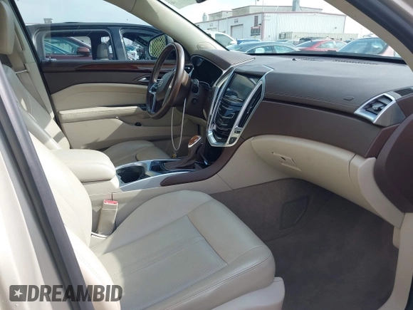 2015 Cadillac SRX Luxury Collection with VIN 3GYFNEE33FS548324, listed as a IAAI auction lot 42029979 with 70,372 mi miles. Bid and sale history available at carsss.com. Image 5.