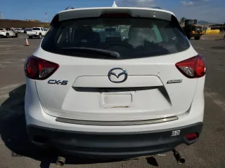 2016 Mazda CX-5 Sport с VIN JM3KE2BY0G0874729, выставлен на аукционе Copart как лот 45242795 с пробегом 70 741 миль миль и Чистый • Clean title. История ставок и продаж доступна на DreamBid. Изображение 6.
