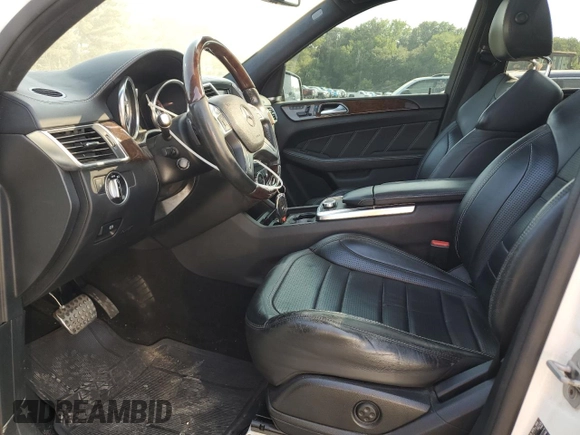 2014 Mercedes-Benz M 63 AMG z VIN 4JGDA7EB6EA344690, wystawiony jako Copart lot #59296955 z przebiegiem 98 090 mil mil oraz Czysty tytuł • Clean title. Historia ofert i sprzedaży dostępna na DreamBid. Obrazek 7.