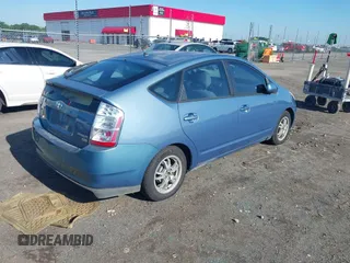 2004 Toyota Prius with VIN JTDKB20U340049006, listed as a IAAI auction lot 42230821 with 252,004 mi miles and . Bid and sale history available at DreamBid. Image 4.