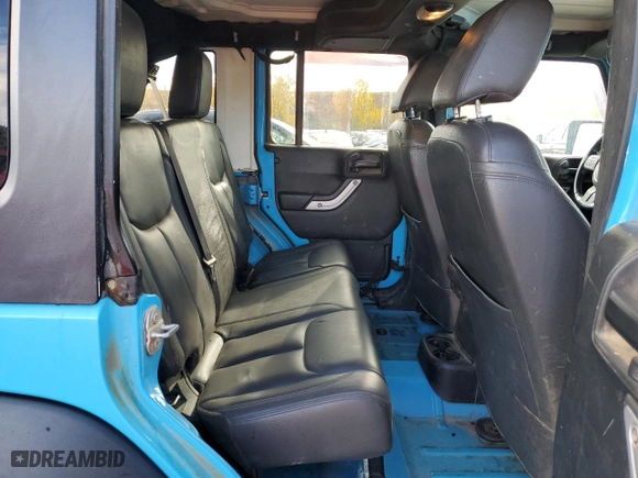 2017 Jeep Wrangler Unlimited Rubicon with VIN 1C4BJWFGXHL584088, listed as a Copart auction lot 76327404 with 127,483 mi miles and Salvage Title. Bid and sale history available at carsss.com. Image 10.
