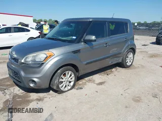 2012 Kia Soul + with VIN KNDJT2A69C7386679, listed as a IAAI auction lot 41969598 with 319,595 mi miles. Bid and sale history available at carsss.com. Image 2.