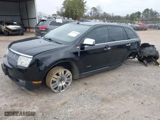 2009 Lincoln MKX with VIN 2LMDU88CX9BJ01593, listed as a IAAI auction lot 41464988 with 129,797 mi miles. Bid and sale history available at carsss.com. Image 2.
