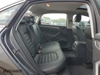 2016 Volkswagen Passat 1.8T SEL with VIN 1VWCT7A32GC065928, listed as a Copart auction lot 69158054 with 133,715 mi miles and Salvage Title. Bid and sale history available at carsss.com. Image 11.