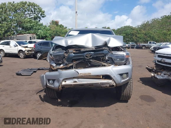 2014 Toyota Tacoma with VIN 3TMLU4EN3EM159080, listed as a IAAI auction lot 41809259 with 113,950 mi miles and . Bid and sale history available at DreamBid. Image 12.