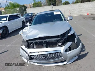 2014 Infiniti Q50 Premium z VIN JN1BV7AP9EM684709, wystawiony jako IAAI lot #41901877 z przebiegiem 91 425 mil mil oraz . Historia ofert i sprzedaży dostępna na DreamBid. Obrazek 13.