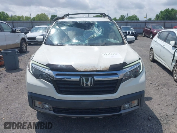 2019 Honda Ridgeline RTL-E with VIN 5FPYK3F77KB021667, listed as a IAAI auction lot 42115019 with 87,221 mi miles and . Bid and sale history available at DreamBid. Image 12.