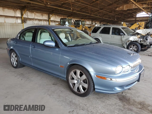 2004 Jaguar X-Type with VIN SAJEA51C14WE06627, listed as a Copart auction lot 54925735 with 107,756 mi miles and Clean Title. Bid and sale history available at DreamBid. Image 4.