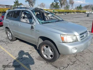 2005 Toyota Highlander with VIN JTEEP21A150087219, listed as a IAAI auction lot 41679304 with 215,467 mi miles. Bid and sale history available at carsss.com. Image 1.