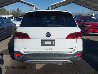 2022 Volkswagen Taos SE z VIN 3VVLX7B20NM097528, wystawiony jako IAAI lot #41152253 z przebiegiem 45 607 mil mil oraz . Historia ofert i sprzedaży dostępna na DreamBid. Obrazek 16.