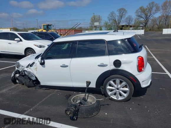 2016 MINI Countryman S with VIN WMWZC3C51GWT10458, listed as a IAAI auction lot 41878799 with 112,019 mi miles and . Bid and sale history available at DreamBid. Image 14.