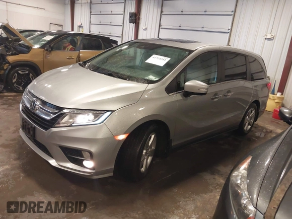 2018 Honda Odyssey EX-L with VIN 5FNRL6H74JB102004, listed as a IAAI auction lot 41724551 with 85,083 mi miles and . Bid and sale history available at DreamBid. Image 2.