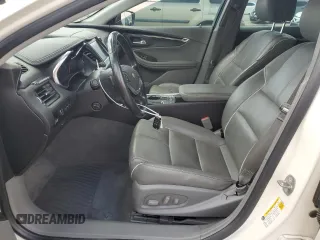 2014 Chevrolet Impala LTZ with VIN 2G1155S39E9316657, listed as a Copart auction lot 52232375 with 122,512 mi miles and Salvage Title. Bid and sale history available at DreamBid. Image 7.