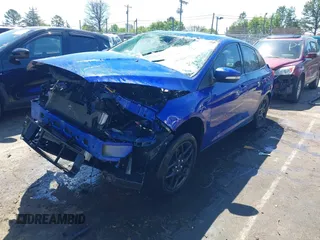 2015 Ford Focus SE with VIN 1FADP3F21FL321890, listed as a IAAI auction lot 41892087 with 193,772 mi miles and . Bid and sale history available at carsss.com. Image 2.
