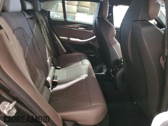 2022 BMW X4 M z VIN 5YM23EC05N9J23246, wystawiony jako Copart lot #48730835 z przebiegiem Nie podano mil oraz Szkoda całkowita • Salvage title. Historia ofert i sprzedaży dostępna na DreamBid. Obrazek 11.