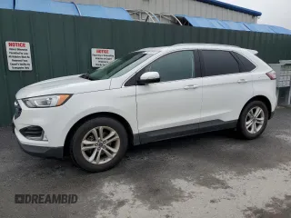 2020 Ford Edge SEL z VIN 2FMPK3J90LBB01559, wystawiony jako Copart lot #61365305 z przebiegiem 120 050 mil mil oraz Czysty tytuł • Clean title. Historia ofert i sprzedaży dostępna na DreamBid. Obrazek 1.
