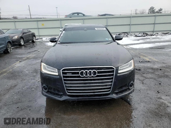 2017 Audi A8 Sport z VIN WAU43AFD2HN003499, wystawiony jako Copart lot #88994855 z przebiegiem 93 734 mil mil oraz Szkoda całkowita • Salvage title. Historia ofert i sprzedaży dostępna na DreamBid. Obrazek 5.