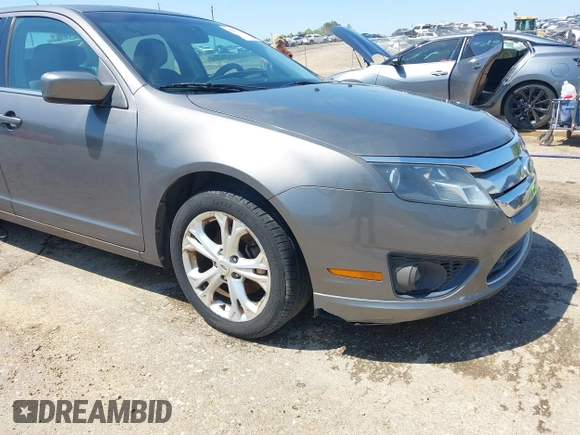 2012 Ford Fusion SE z VIN 3FAHP0HA4CR232641, wystawiony jako IAAI lot #42057070 z przebiegiem 180 793 mil mil oraz . Historia ofert i sprzedaży dostępna na DreamBid. Obrazek 17.
