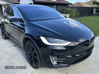 2019 Tesla Model X 75D with VIN 5YJXCDE26KF162372, listed as a IAAI auction lot 41611262 with 35,966 mi miles. Bid and sale history available at carsss.com. Image 1.