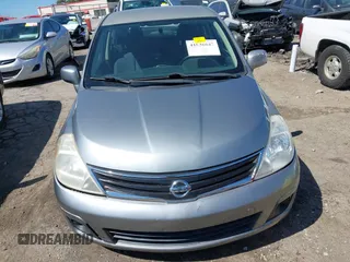 2012 Nissan Versa S with VIN 3N1BC1CP0CK206613, listed as a IAAI auction lot 41836647 with 180,698 mi miles. Bid and sale history available at carsss.com. Image 12.