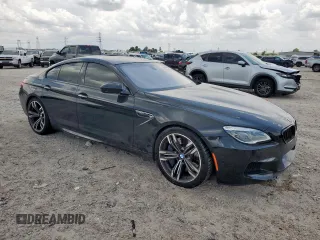 2016 BMW M6 with VIN WBS6E9C57GG437110, listed as a Copart auction lot 65406605 with 95,066 mi miles and Clean title. Bid and sale history available at DreamBid. Image 4.