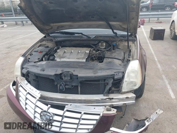 2007 Cadillac DTS Luxury I z VIN 1G6KD57Y07U142067, wystawiony jako IAAI lot #41797850 z przebiegiem 179 639 mil mil oraz . Historia ofert i sprzedaży dostępna na DreamBid. Obrazek 10.