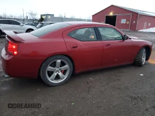 2006 Dodge Charger SRT-8 with VIN 2B3LA73W16H480803, listed as a Copart auction lot 84769274 with 110,243 mi miles and Salvage Title. Bid and sale history available at DreamBid. Image 3.