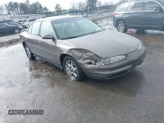 2000 Oldsmobile Intrigue GLS z VIN 1G3WX52H9YF131166, wystawiony jako IAAI lot #41527895 z przebiegiem 104 534 mil mil oraz . Historia ofert i sprzedaży dostępna na DreamBid. Obrazek 1.