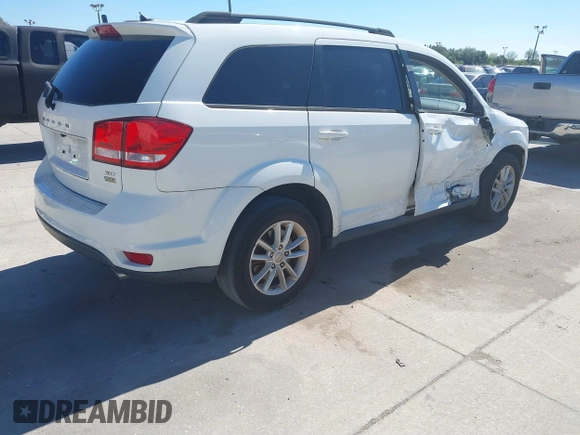 2017 Dodge Journey SXT z VIN 3C4PDCBG9HT510635, wystawiony jako IAAI lot #41590439 z przebiegiem 131 054 mil mil oraz . Historia ofert i sprzedaży dostępna na DreamBid. Obrazek 4.