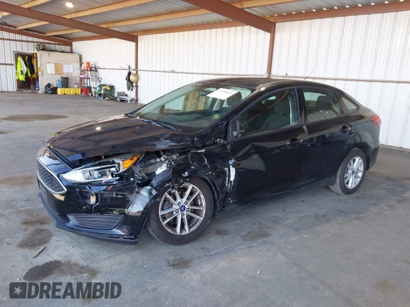 2017 Ford Focus SE with VIN 1FADP3F26HL219875, listed as a IAAI auction lot 41756026 with 70,493 mi miles. Bid and sale history available at carsss.com. Image 6.
