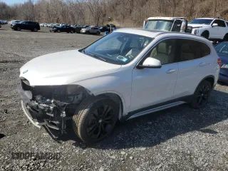 2020 BMW X1 xDrive28i with VIN WBXJG9C00L5P60455, listed as a Copart auction lot 52353875 with 77,709 mi miles and Salvage Title. Bid and sale history available at carsss.com. Image 1.