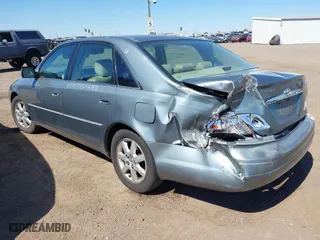 2001 Toyota Avalon XL w/Bucket Seats with VIN 4T1BF28B31U150439, listed as a IAAI auction lot 41868466 with 210,828 mi miles. Bid and sale history available at carsss.com. Image 3.