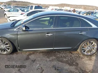 2013 Cadillac XTS with VIN 2G61N5S34D9231315, listed as a IAAI auction lot 41092660 with 206,093 mi miles. Bid and sale history available at carsss.com. Image 14.