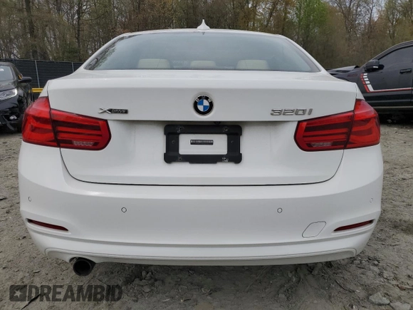2017 BMW 3 Series 320i xDrive with VIN WBA8E5G5XHNU22436, listed as a Copart auction lot 52702805 with 74,008 mi miles and Salvage title. Bid and sale history available at DreamBid. Image 6.