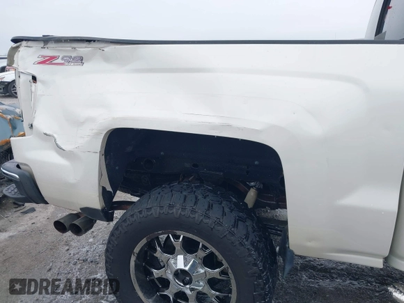2014 Chevrolet Silverado 1500 LTZ with VIN 3GCUKSEJ3EG434991, listed as a IAAI auction lot 41385058 with 106,183 mi miles and . Bid and sale history available at DreamBid. Image 19.