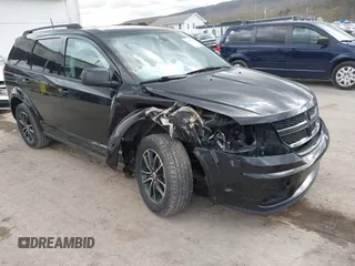 2018 Dodge Journey SE with VIN 3C4PDCAB1JT446005, listed as a IAAI auction lot 42001854 with 70,074 mi miles and . Bid and sale history available at DreamBid. Image 6.