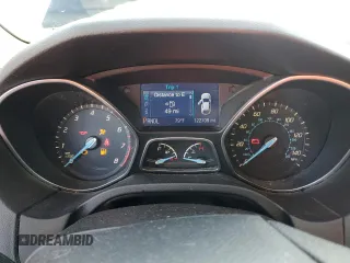 2013 Ford Focus SE z VIN 1FADP3F27DL369634, wystawiony jako Copart lot #61409725 z przebiegiem 122 709 mil mil oraz Szkoda całkowita • Salvage title. Historia ofert i sprzedaży dostępna na DreamBid. Obrazek 9.