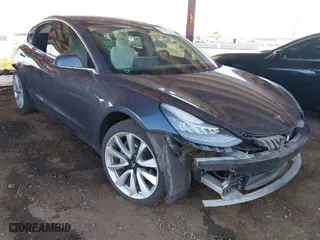 2018 Tesla Model 3 Long Range Battery with VIN 5YJ3E1EA3JF169132, listed as a IAAI auction lot 41678383 with 170,809 mi miles. Bid and sale history available at carsss.com. Image 1.